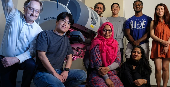UA ECE professor and grad students