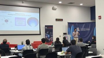 Professor presenting to a group of students