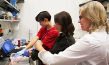 Jennifer Barton (right) works with two high school students from the BIO5 Institute's KEYS internship program.