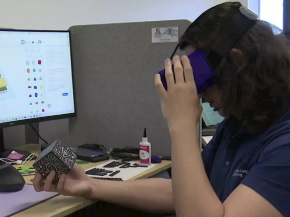 Jaeden Carpenter, an electrical and computer engineering student, uses virtual reality to learn about microchip development.