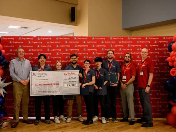 University of Arizona Design Day Team 24009 celebrates their $5,000 award from Raytheon Technologies for Best Overall Design for their multi-legged robot.