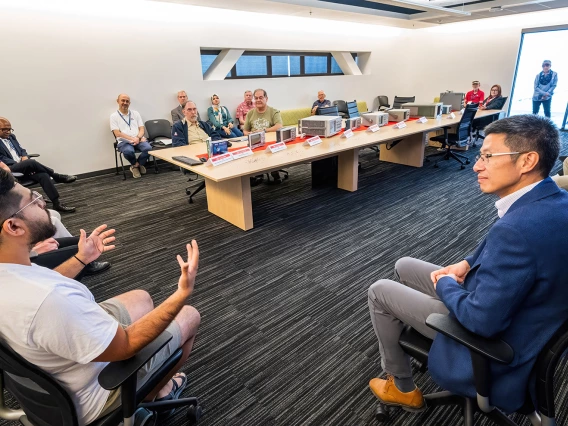 people seated in conference room