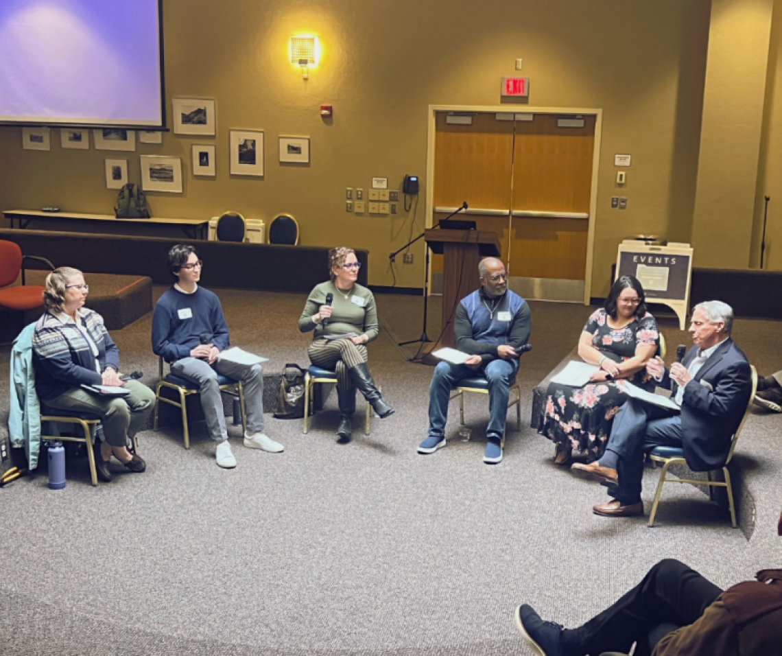 group of people, seated in circle