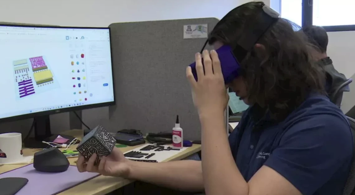 Jaeden Carpenter, an electrical and computer engineering student, uses virtual reality to learn about microchip development.