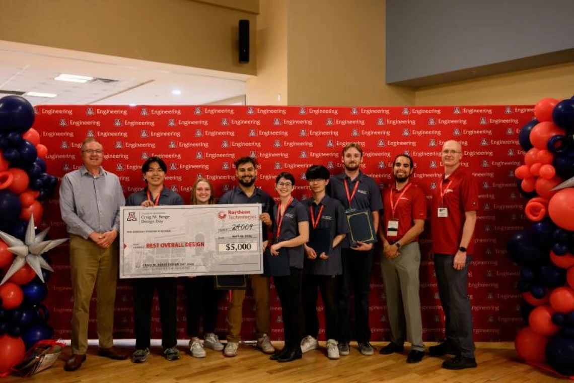 University of Arizona Design Day Team 24009 celebrates their $5,000 award from Raytheon Technologies for Best Overall Design for their multi-legged robot.