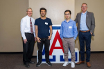 ECE associate department head Hal Tharp, ECE outstanding graduate teaching assistants Yuchao Liao and Milad Taghipour, and Craig M. Berge Dean of the College of Engineering David W. Hahn