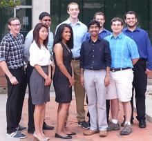 Undergraduate students from across the United States take a break from participating in this summer's REU CAT vehicle research program.