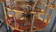 Close up of a complicated copper device, a quantum computer.