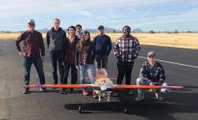 Team photo with their model airplane for the 2021 Arizona Autonomous competition