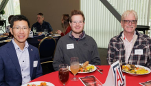 Karson Knudson, center, is honored by the ECE department at the fall 2023 outstanding seniors award luncheon.