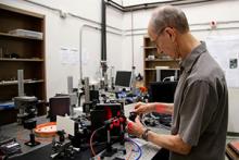 Raymond Kostuk exhibits the bench-top VHIS in his lab; image courtesy of Taylor Hudson/Tech Launch Arizona