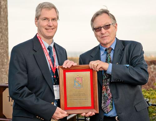 Associate ECE department head Hal Tharp (left) accepts the IEEE-HKN Outstanding Chapter Award for the UA student chapter from Stephen Goodnick, past president of the IEEE-HKN board of governors, in Hilton Head, South Carolina.