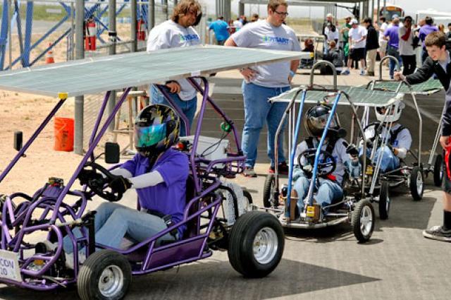 Solar go-karts head for the track at the 2015 race day held April 25 at Musselman Honda Circuit in Tucson, Arizona.