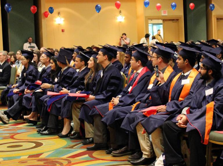 Students honor faculty and staff at ECE's pre-commencement ceremony. 